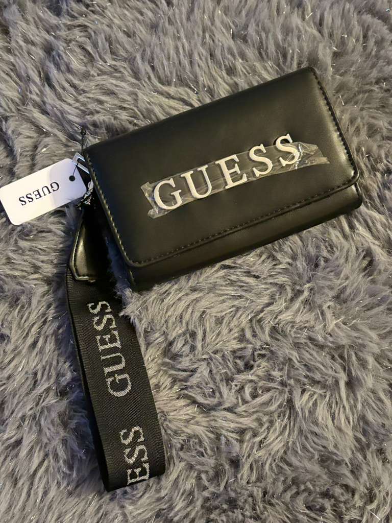 Cartera muñequera Guess Negra